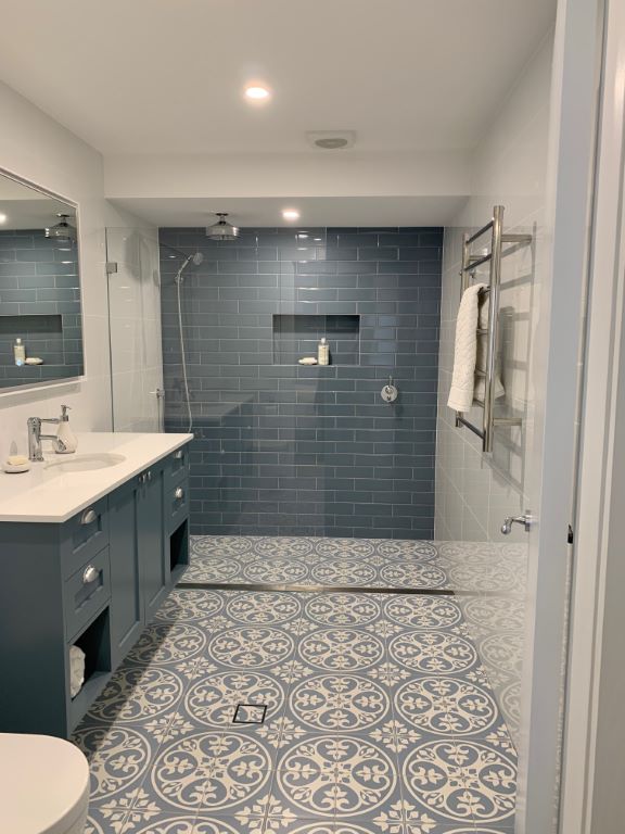 Classic Grey and White Bathroom with Patterned Floor Tiles