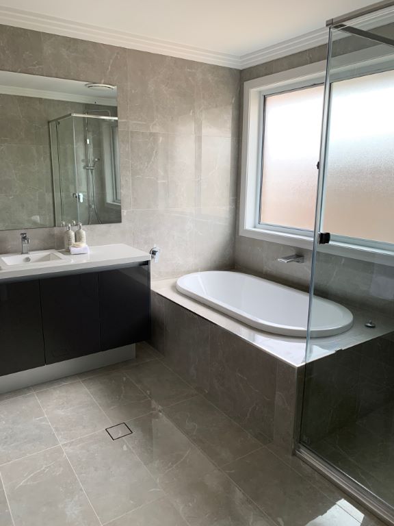 Modern Luxe Bathroom with Oval Bathtub