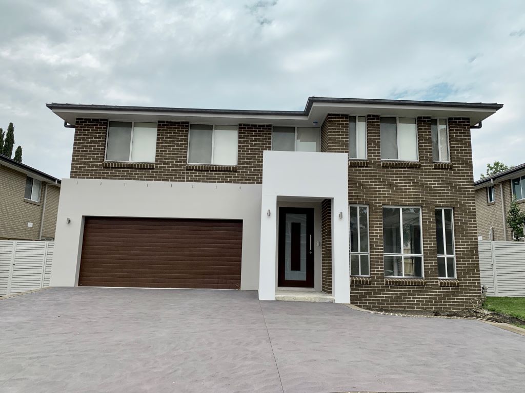Modern New Build Exterior in Brick and Render