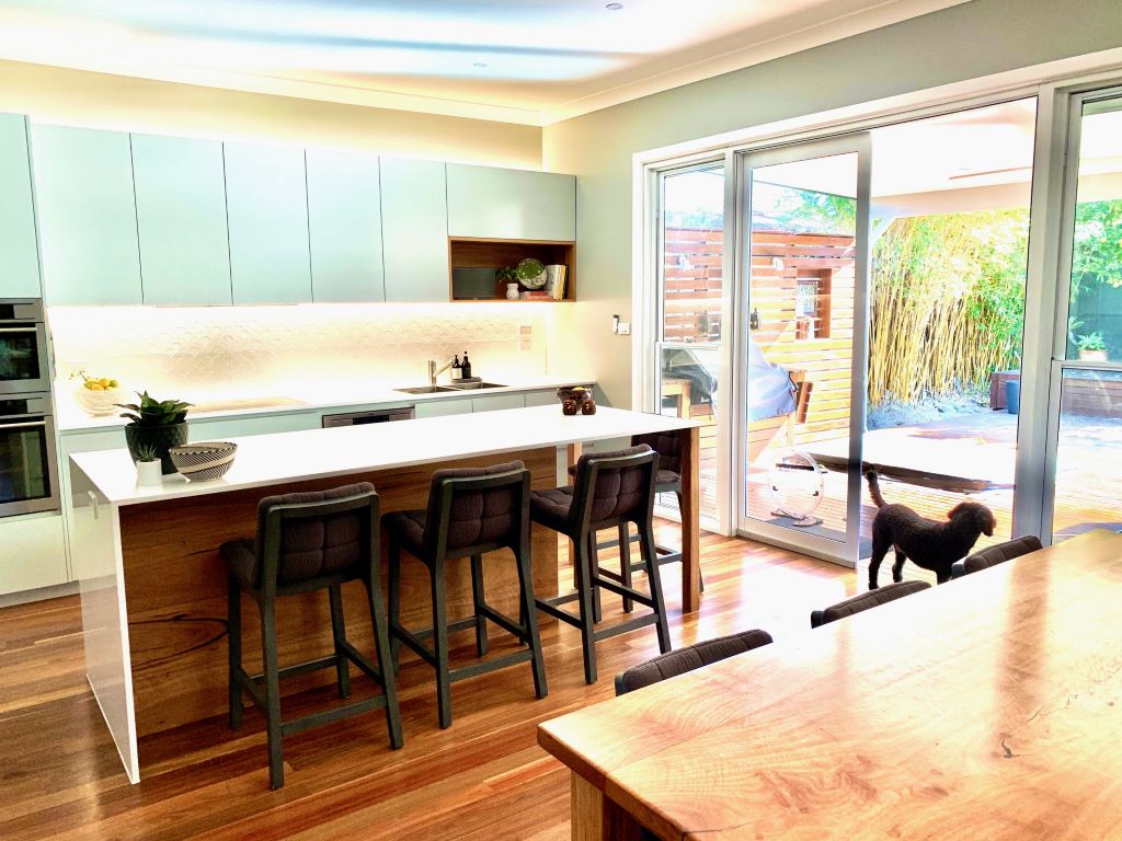 Modern Rustic Kitchen/Dining Space with Textured Splashback