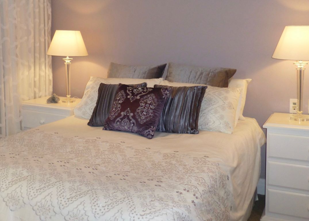 Romantic Bedroom in Moody Purples